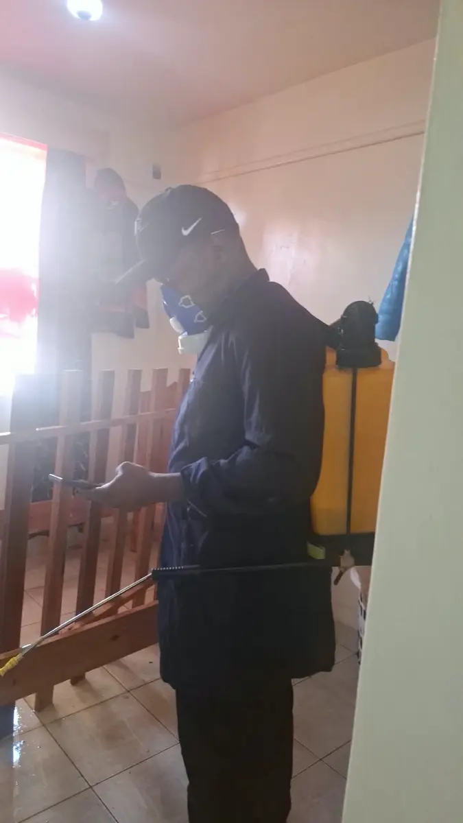 PrimeMax applying targeted spray after bedbug heat treatment