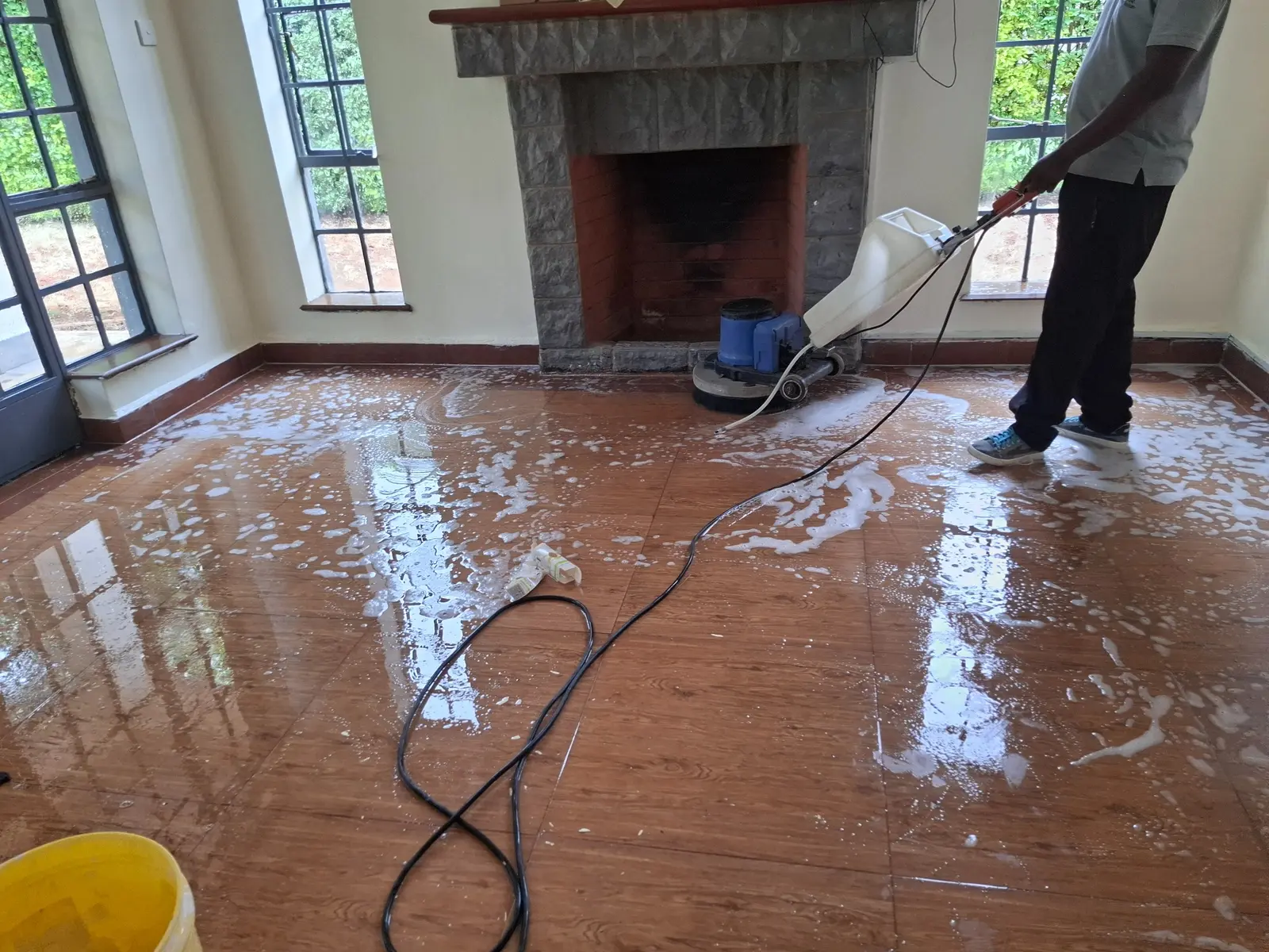 PrimeMax floor scrubbing machine cleaning a post-construction floor